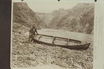Charles Russell sitting on the "Utah." Note the bulkheads and the seat