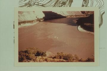 Down Cataract Canyon at its head. The Colorado enters at the left and the Green River from right