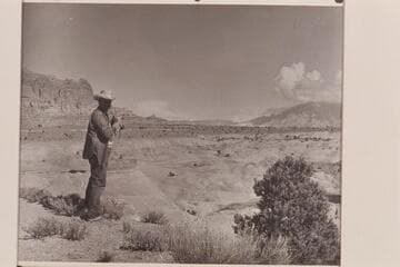 Bill Belknap stands on the edge of the plateau on the East side of the Octagon. The canyon in front of him separates this plateau from Rainbow Mesa and the foot of Navajo Mountain