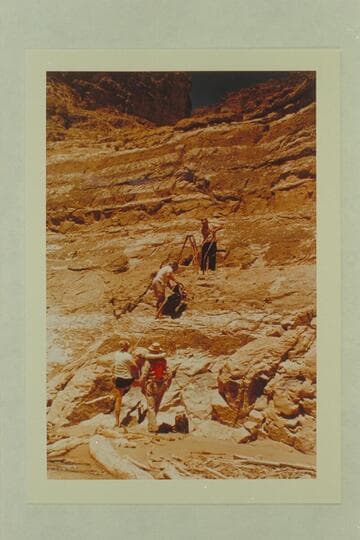 Rigging the camera. Paradise Canyon. Gordon Avil and Jim Algar on beach. Dick Kelley and Doc Reed on cliff