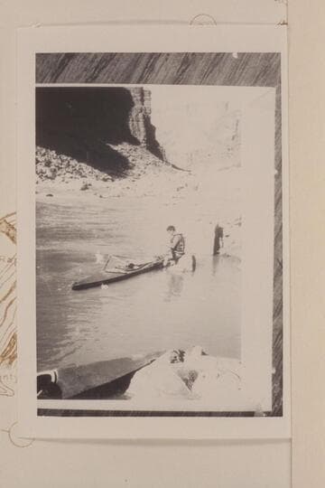 Les Jones replacing lock broken in 23 1/2 Mile Rapid. The Gendarme is at upper margin
