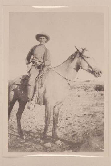 Shell Baman on a gray horse of mine when we were running wild horses in northeastern Arizona. Shell was a hand. Ride anything run wild horses over any kind of ground and stay with the leaders--CHS