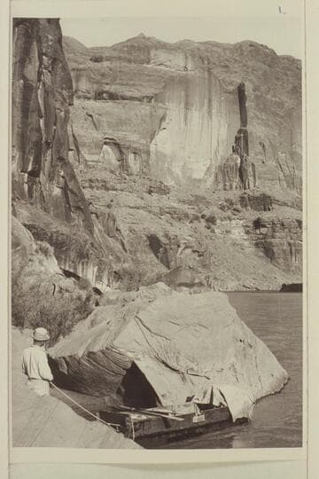F. A. Thurman holding the "Moenkopi." Lower San Juan Canyon