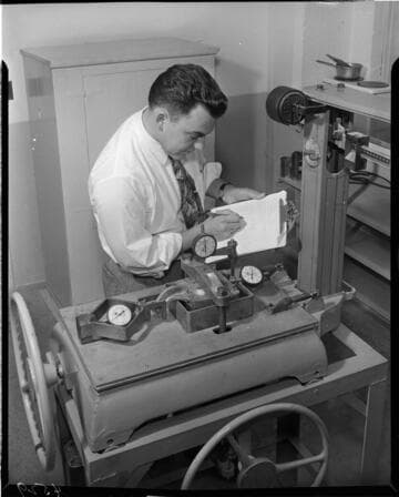 Man testing a device on a scale