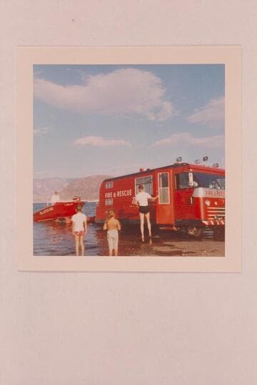 Bill Austin in the boat directing the launching of the jet fire boat. Boat landing at Boulder City