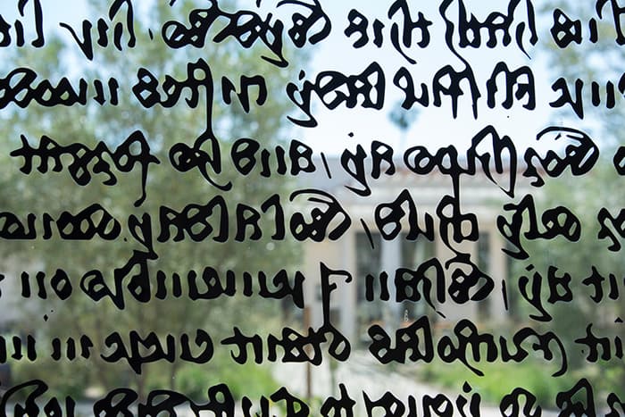 Window with decal of manuscript