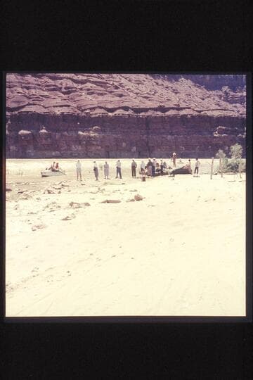 MHE party departs Paria Riffle. Toll and Dines craft on beach
