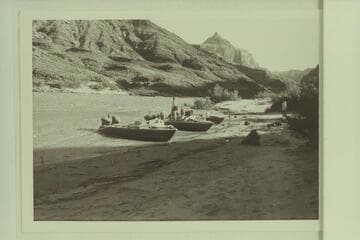 Boats moored at Mile 66 camp; Temple Butte in distance
