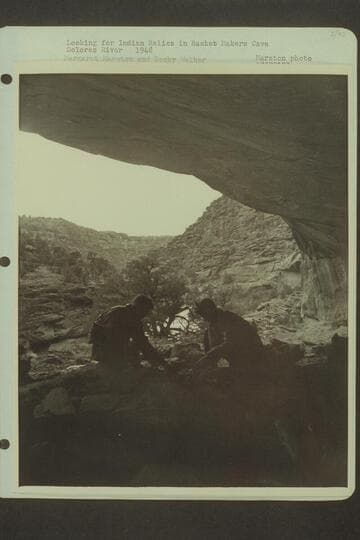 Looking for Indian relics in Basket Makers Cave, Dolores River. Margaret Marston and Becky Walker