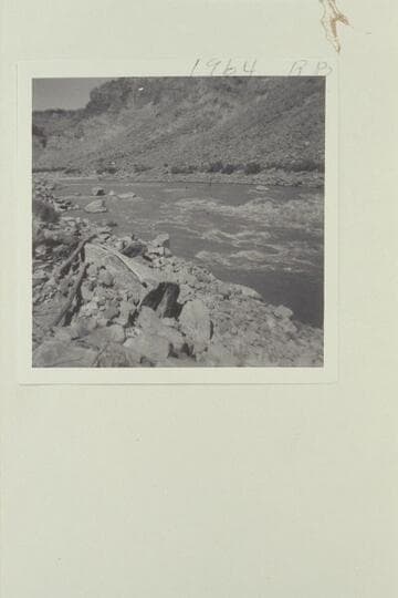 Up to head of Rapid 16. The flat rock out from the left shore is the one which trapped the boat of the Best Expedition