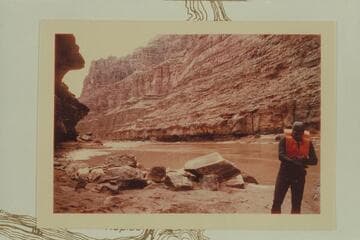 Down river from the beach at the D. Julien inscription, Mile 185.75. Bill Belknap adjusts his gloves at right