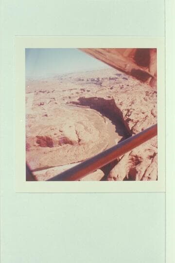 Up the Colorado River from above the mouth of Anasazi Canyon. The Henry Mountains are upper right