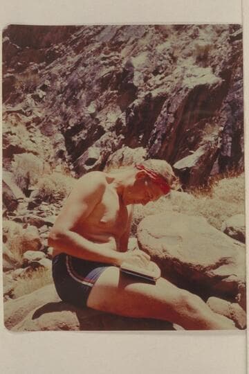 Bob Malott writes the record. Camp at Mile 107