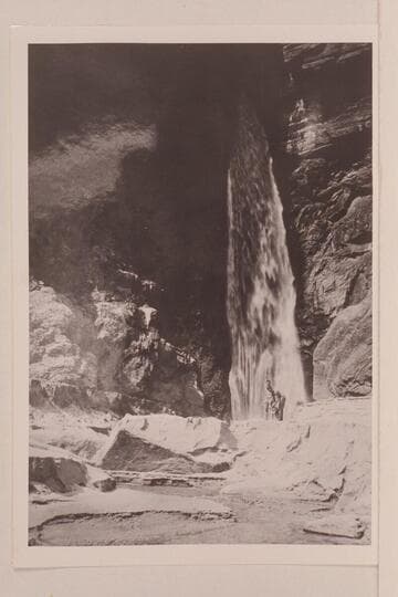 Deer Creek Falls. Carey and Callaway appear in the photo, the latter petting the dog