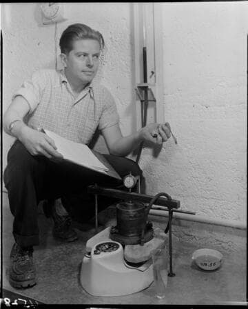 Man testing a device on a scale