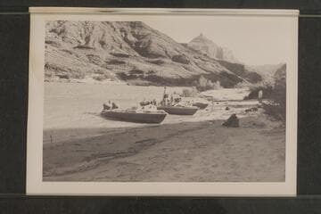 Boats moored at Mile 66 camp; Temple Butte in distance