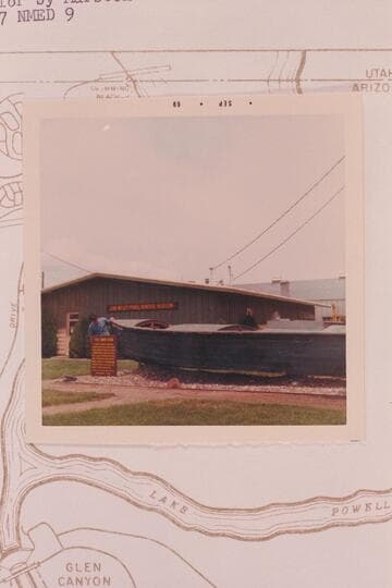 Nate examines the Powell boat at the Museum at Page. The "Emma Dean" according to Disney